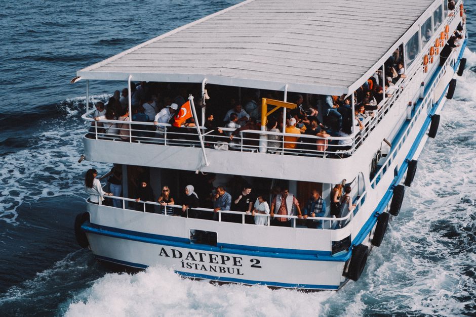Passengers enjoy a scenic ferry ride on the Bosphorus in Istanbul, Turkey.
